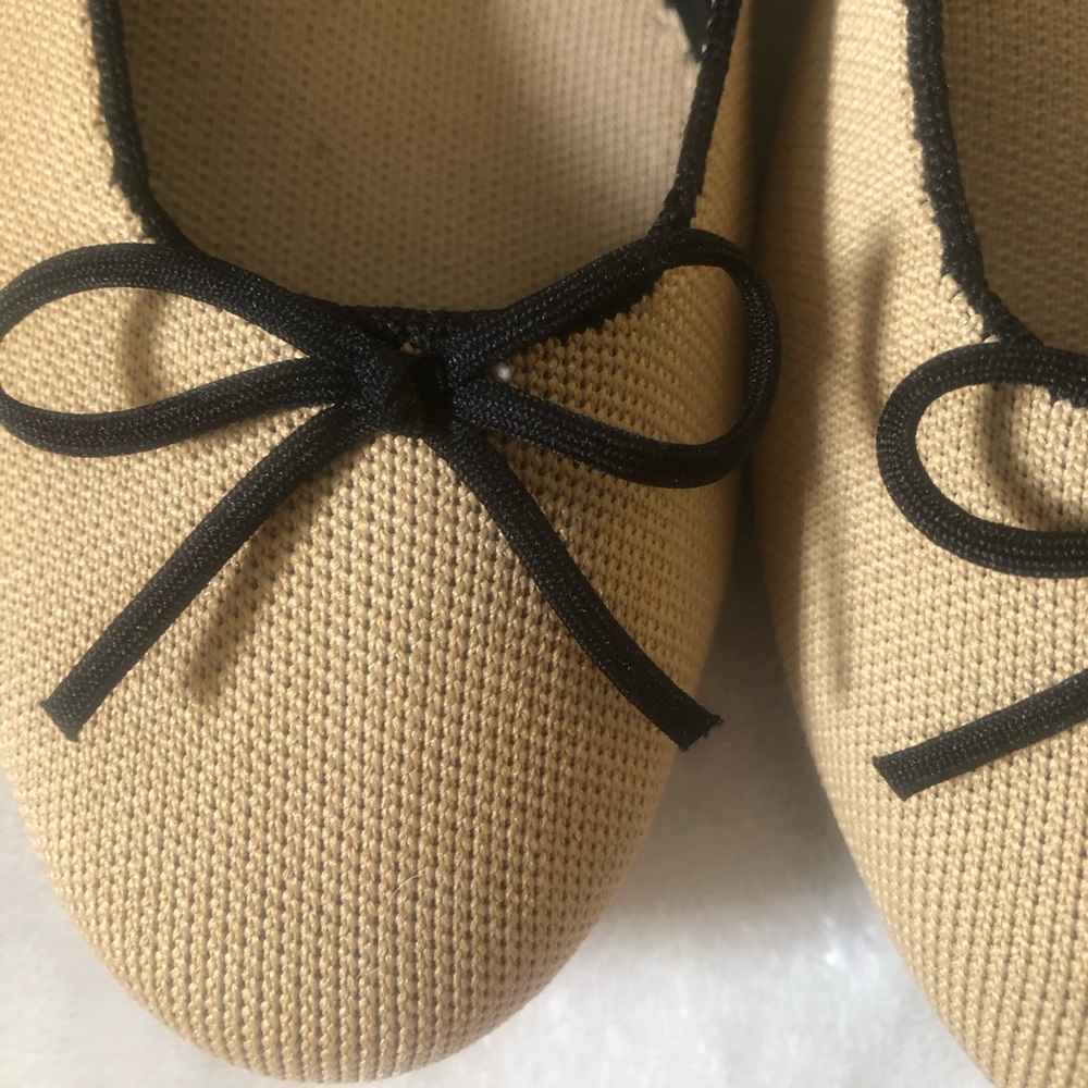 Rothy's Beige Ballet Flats with Black Trim and Bow - Picture 3 of 5